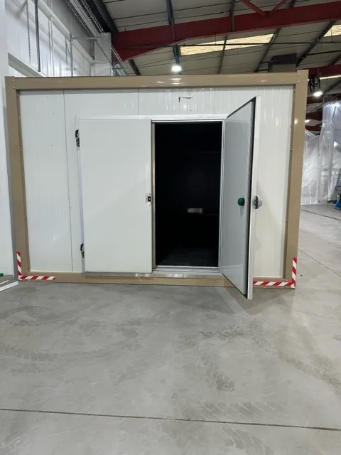 Newly installed cold room pod with its door open